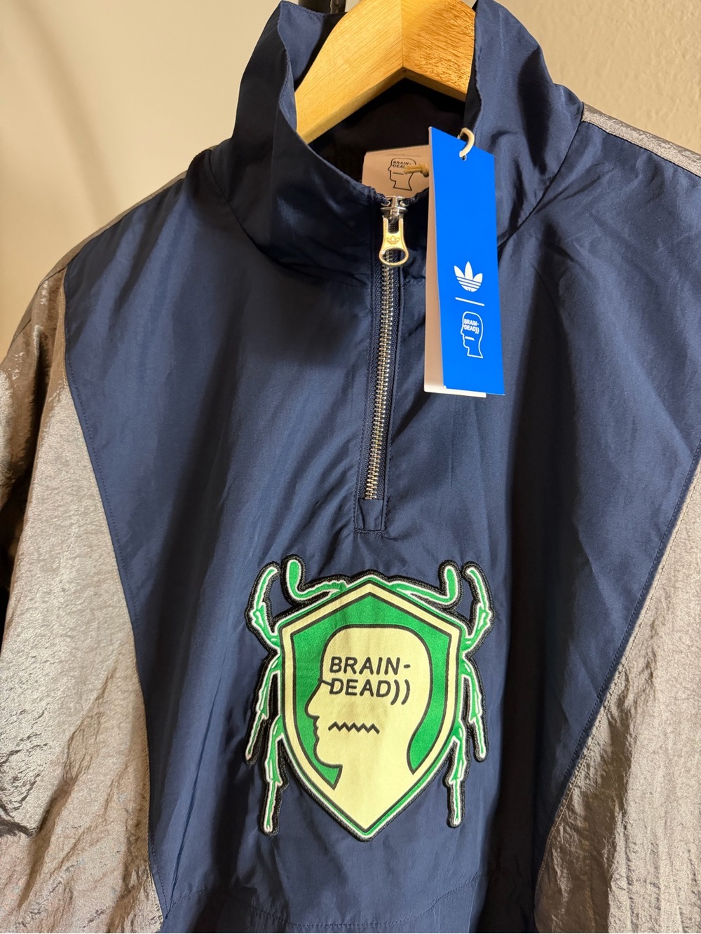 Brian Dead x Adidas Navy Windbreaker with Silver Panels and Green Chest Emblem - Picture 2 of 3